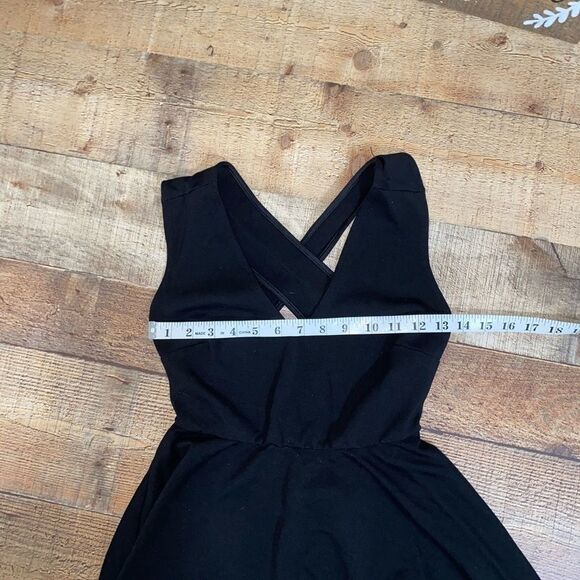 Lulus black cross back peplum top - Picture 8 of 10